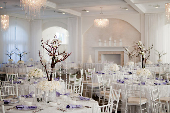 photo of ivory purple real wedding manzanita branch centerpieces