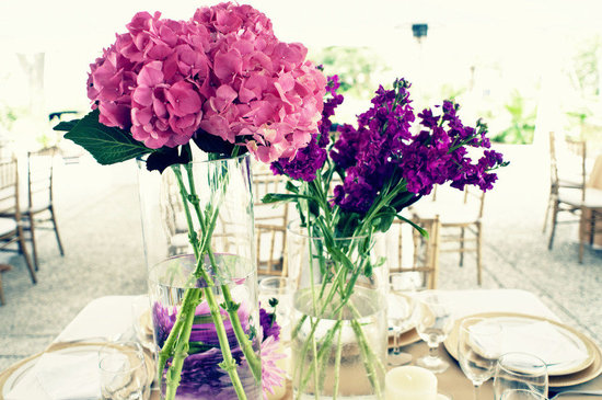 photo of Wedding flower inspiration in every color under the sun- pink and purple centerpieces