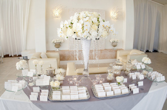 photo of Elegant white orchid topiary wedding centerpiece
