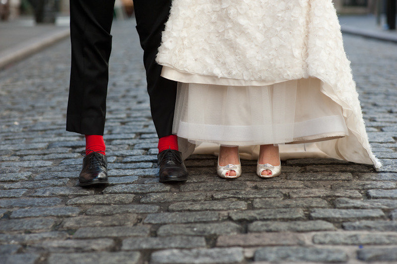 Ivory-wedding-dress-and-peep-toe-bridal-heels-groom-wears-red-socks.full
