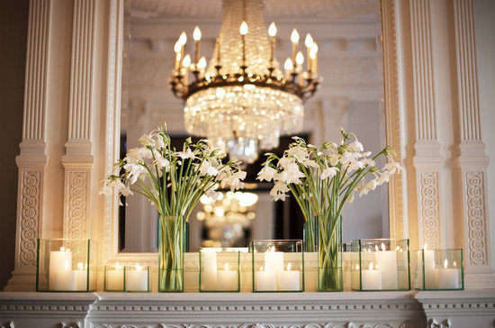 photo of elegant wedding reception venue ivory wedding flowers candles