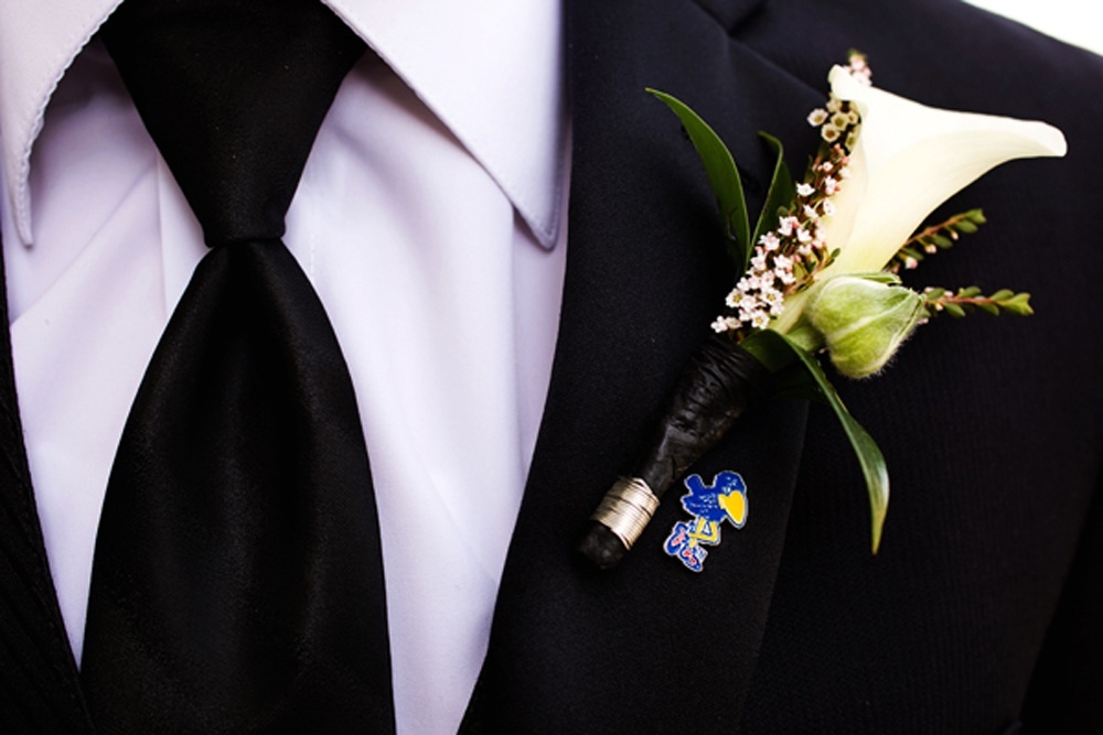 Classic-grooms-attire-black-tux-ivory-tie-bout.full