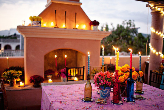 photo of colorful wedding reception southwest theme bright wedding flowers outdoor venue