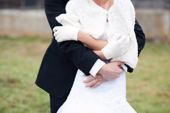 photo of winter wedding bride groom embrace