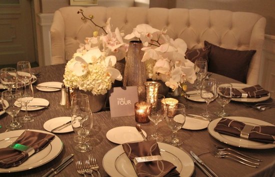 photo of neutral wedding color palette ivory hydrangea white orchid wedding flowers