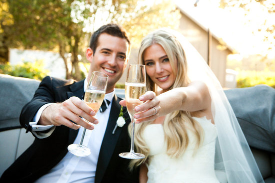 photo of Handsome grooms wearing tuxes and suits, elegant boutonnieres