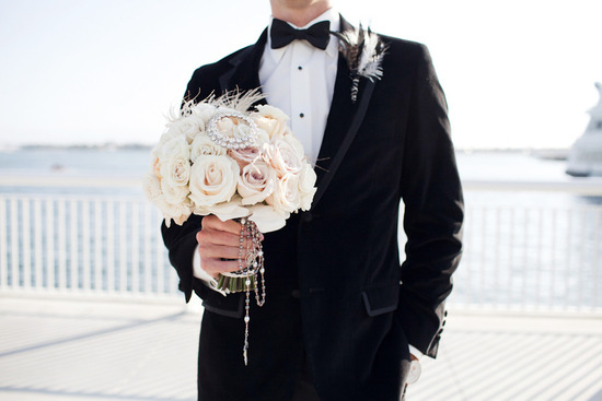 photo of Handsome grooms wearing tuxes and suits, elegant boutonnieres