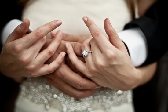 photo of artistic wedding photography diamond engagement ring shot
