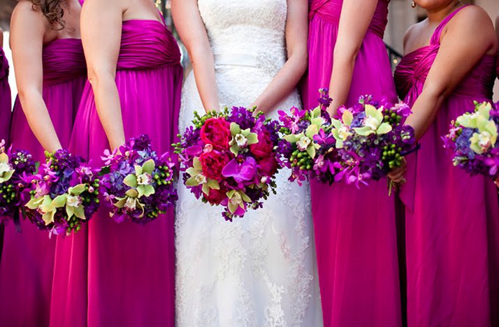 Hot-pink-bridesmaids-dresses-long-tropical-bouquets.full