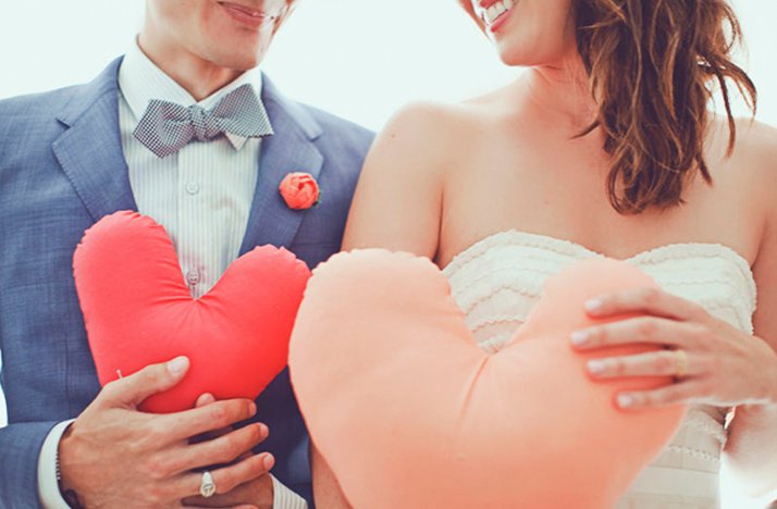 Valentines-themed-wedding-photos-bride-groom-hold-hearts-diy.full