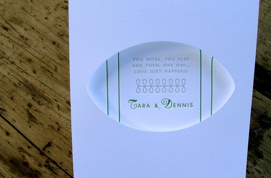 photo of Classic white letterpress wedding invitation with a touch of football inspiration