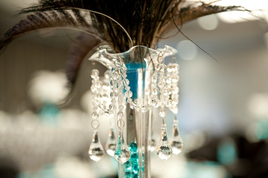 photo of glamourous brides guide to wedding day style feather crystal centerpiece