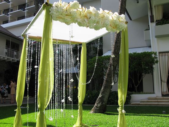 photo of bamboo wedding inspiration outdoor ceremony arbor