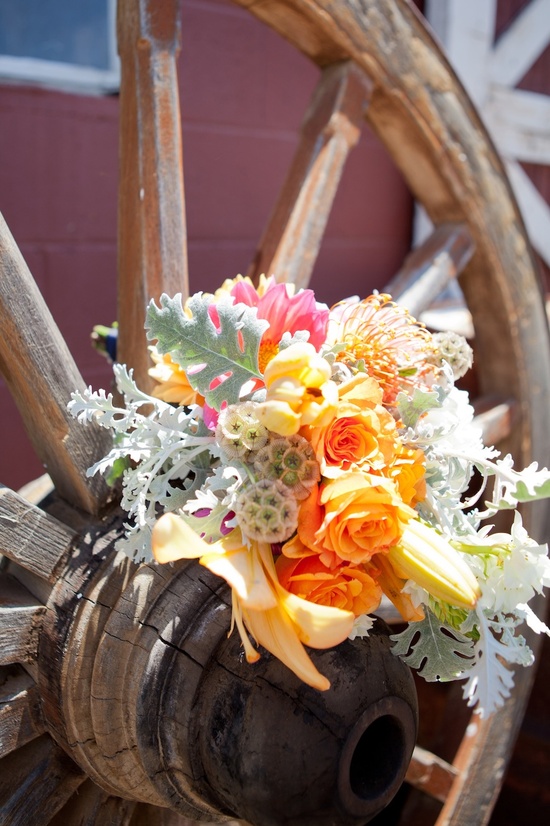 photo of 2 Kentucky Derby inspired wedding theme bridal shower inspiration barn venue romantic bouquet