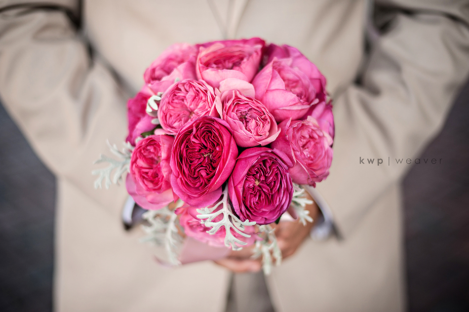 Elegant-southern-wedding-summer-2012-groom-with-brides-bouquet.full