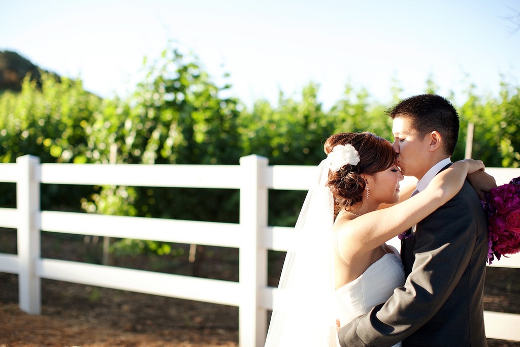 Bride-groom-kiss-at-malibu-california-wedding.full