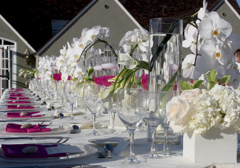 Beach-wedding-tablescape-white-orchids-ivory-hydrangeas.full