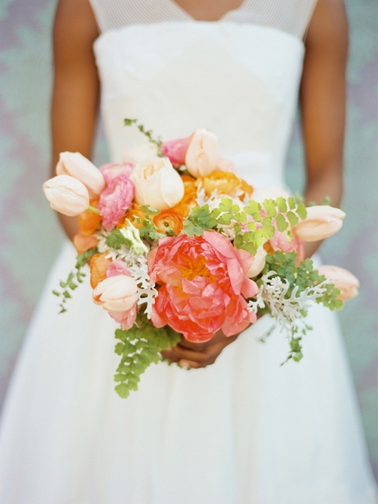 photo of stunning wedding flowers peach coral pink green bridal bouquet