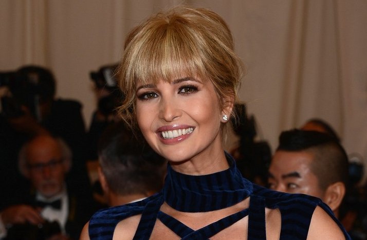 Wedding-hair-makeup-inspiration-2012-met-ball-red-lips-sleek-updo-bangs-tendrils.full