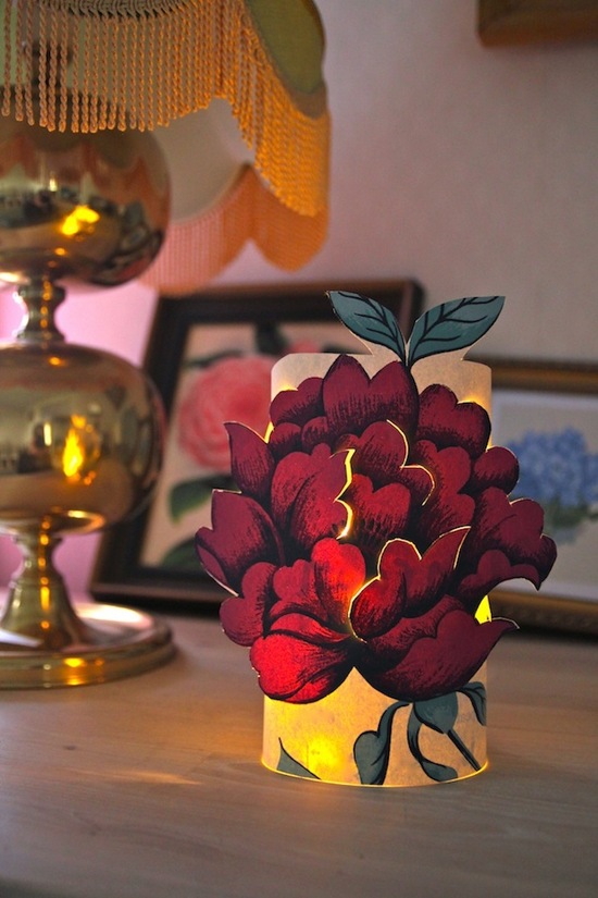 photo of unique wedding DIYs floral covered table luminary