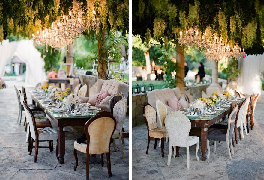 Pretty-wedding-chairs-outdoor-reception-beneath-chandeliers.full