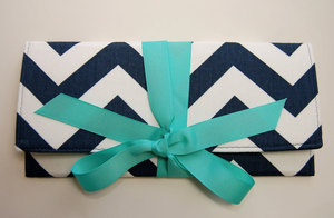 photo of wedding color inspiration navy blue bridal wedding finds chevron clutch turquoise bow
