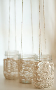Things-brides-love-mason-jar-wedding-reception-decor-centerpieces-chrochet-chandelier.medium