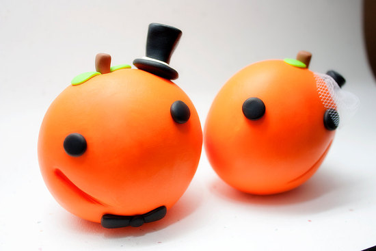 handmade wedding finds for Halloween themed I Dos adorable pumpkin cake topper